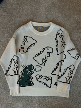 Amazon White Crewneck Sweater with Dinosaur Graphic